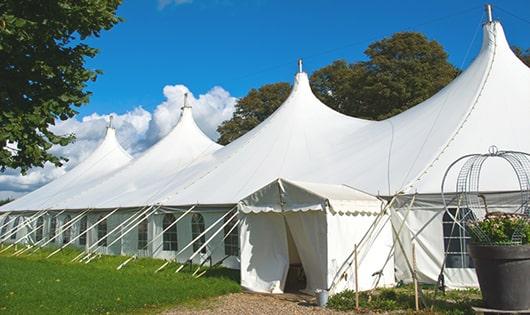 high-quality portable restrooms stationed at a wedding, meeting the needs of guests throughout the outdoor reception in Lansing KS